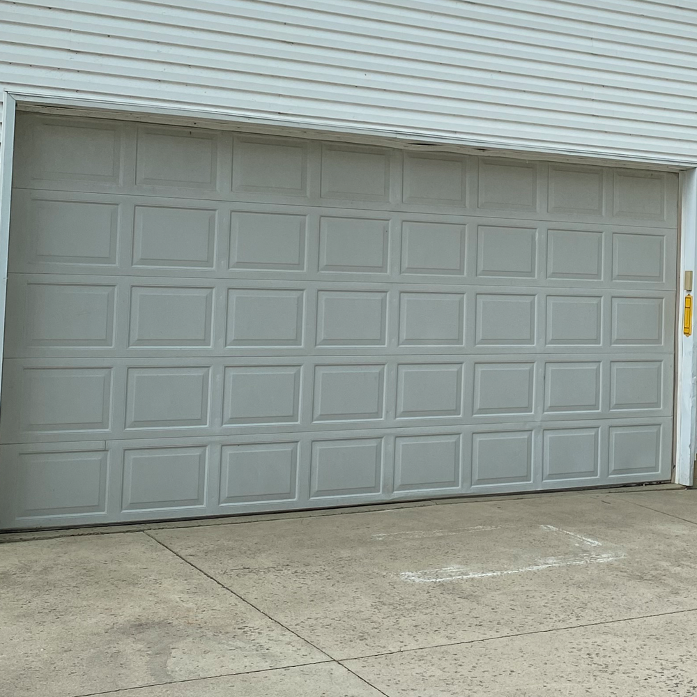 Garage Door Spring Repair: Warning Signs, Risks & When to Call a Pro
